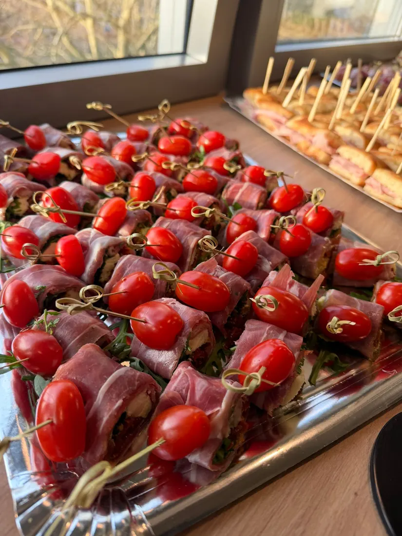Prosciutto rolls with cherry tomatoes
