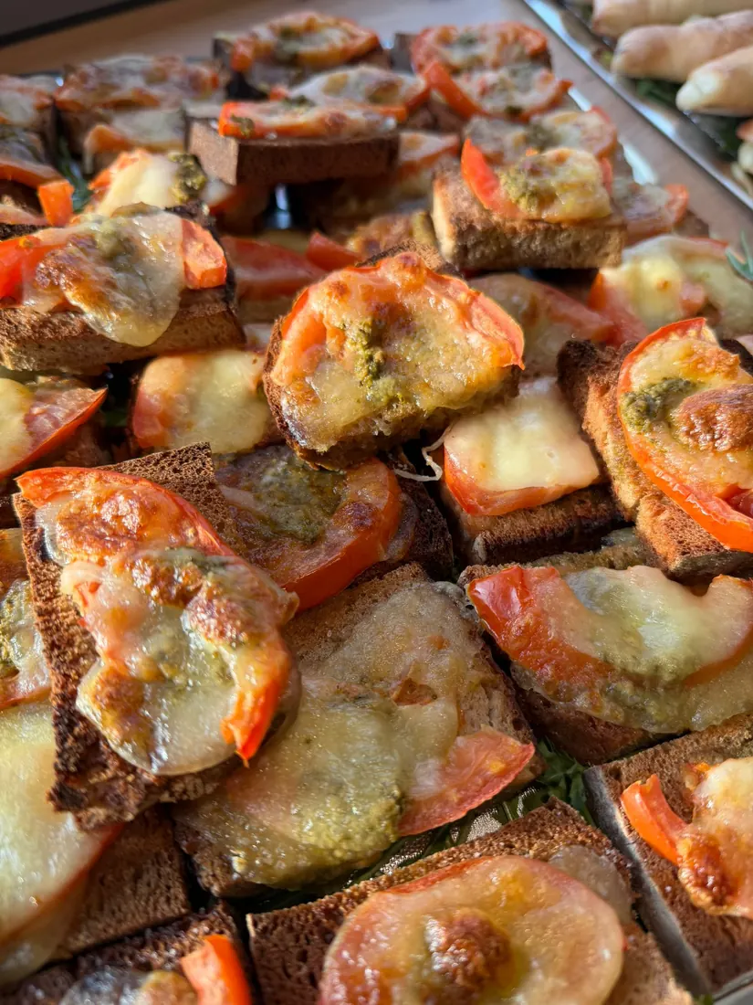 Baked bruschetta with tomato and mozzarella